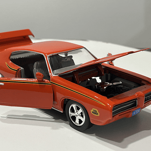 Pontiac GTO Judge 1969 naranja 1:24 Motormax – Muscle car clásico americano de colección 
