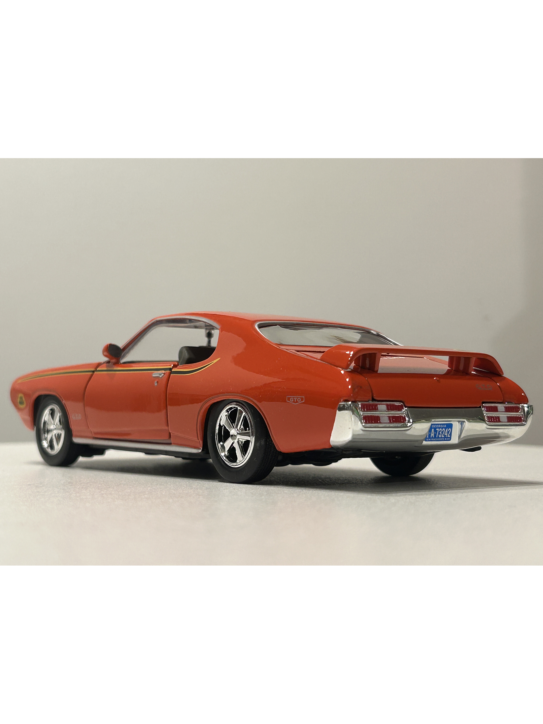 Pontiac GTO Judge 1969 naranja 1:24 Motormax – Muscle car clásico americano de colección  9