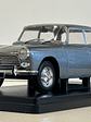 Peugeot 404 1960 gris metálico 1:24 WhiteBox – Clásico francés de colección  - Miniatura 1