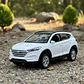 Auto Hyundai Tucson SUV | Welly 1:32 Coleccionable - thumbnail 1