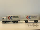 Volvo F12 “Nederlandse Pakket Dienst” Tekno 1:50 – Camión con remolque clásico holandés de reparto de paquetes - thumbnail 10