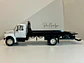 Grúa Jada Toys International DuraStar 4400 Flat Bed 1:24 - Miniatura 6