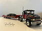 Camión Mack Granite con Rampla Cama Baja | First Gear 1:34 - Miniatura 1