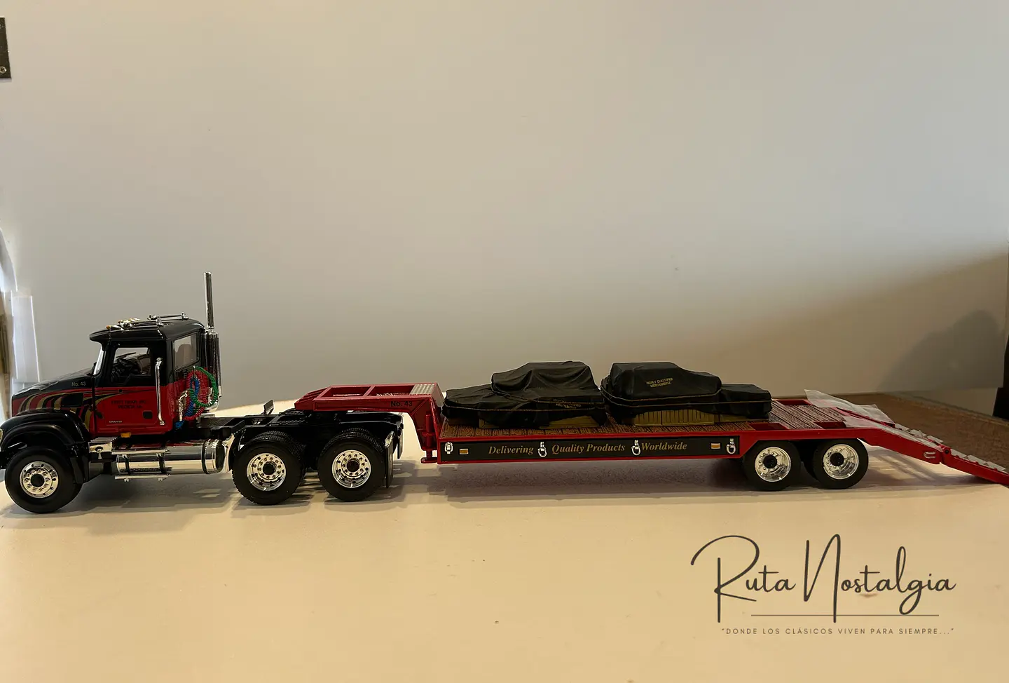 Camión Mack Granite con Rampla Cama Baja | First Gear 1:34 6