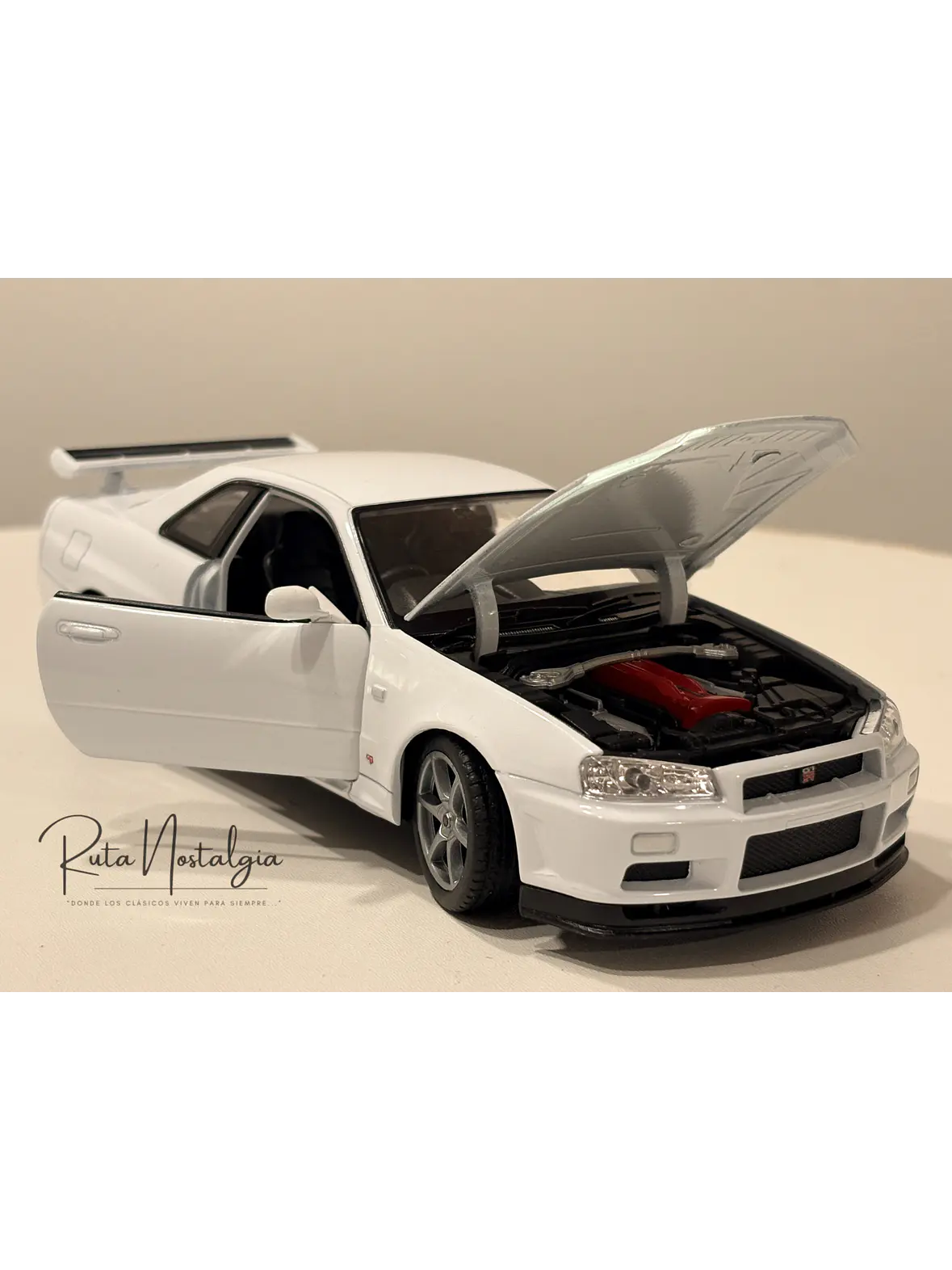 Nissan Skyline GT-R (R34) — Welly NEX Models 1:24 | JDM Legend de colección 1