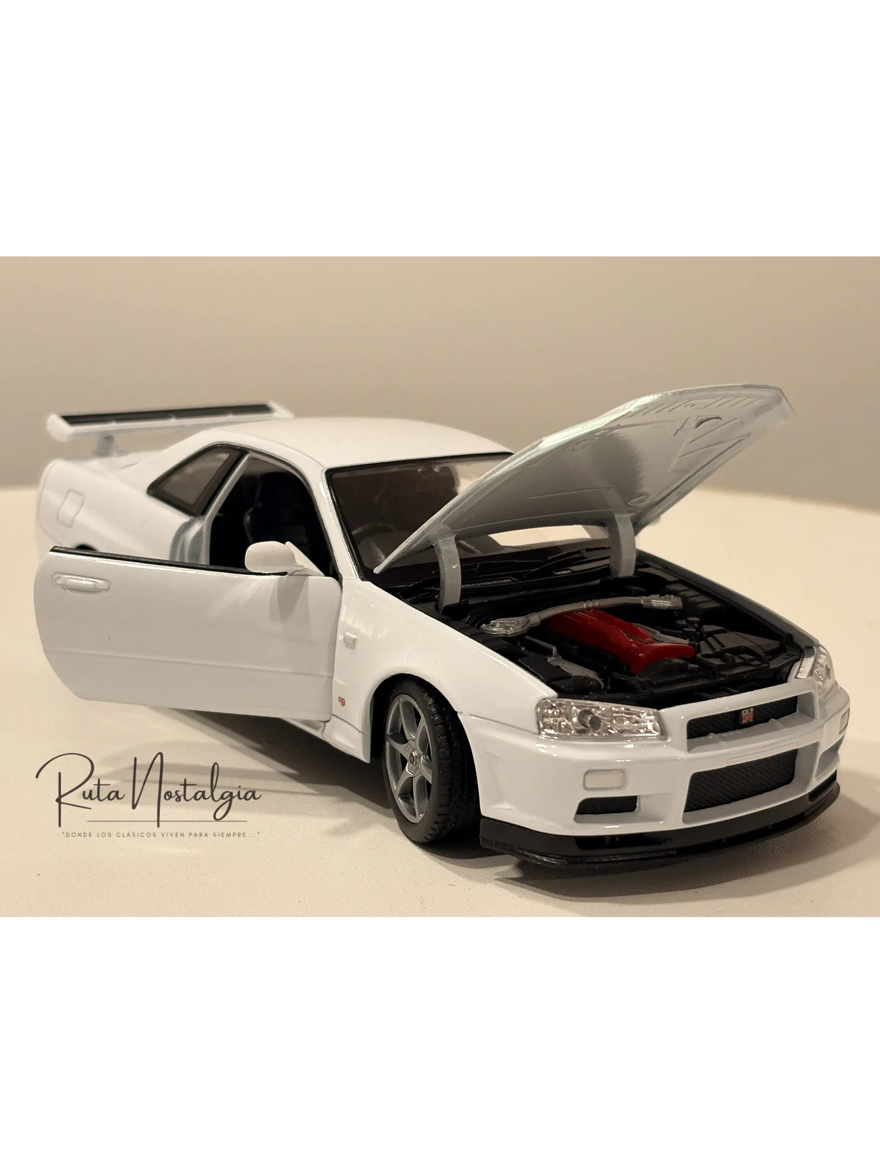 Nissan Skyline GT-R (R34) — Welly NEX Models 1:24 | JDM Legend de colección 1