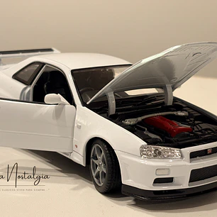 Nissan Skyline GT-R (R34) — Welly NEX Models 1:24 | JDM Legend de colección