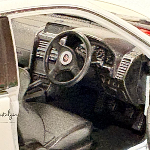 Nissan Skyline GT-R (R34) — Welly NEX Models 1:24 | JDM Legend de colección