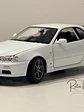Nissan Skyline GT-R (R34) — Welly NEX Models 1:24 | JDM Legend de colección - Miniatura 5