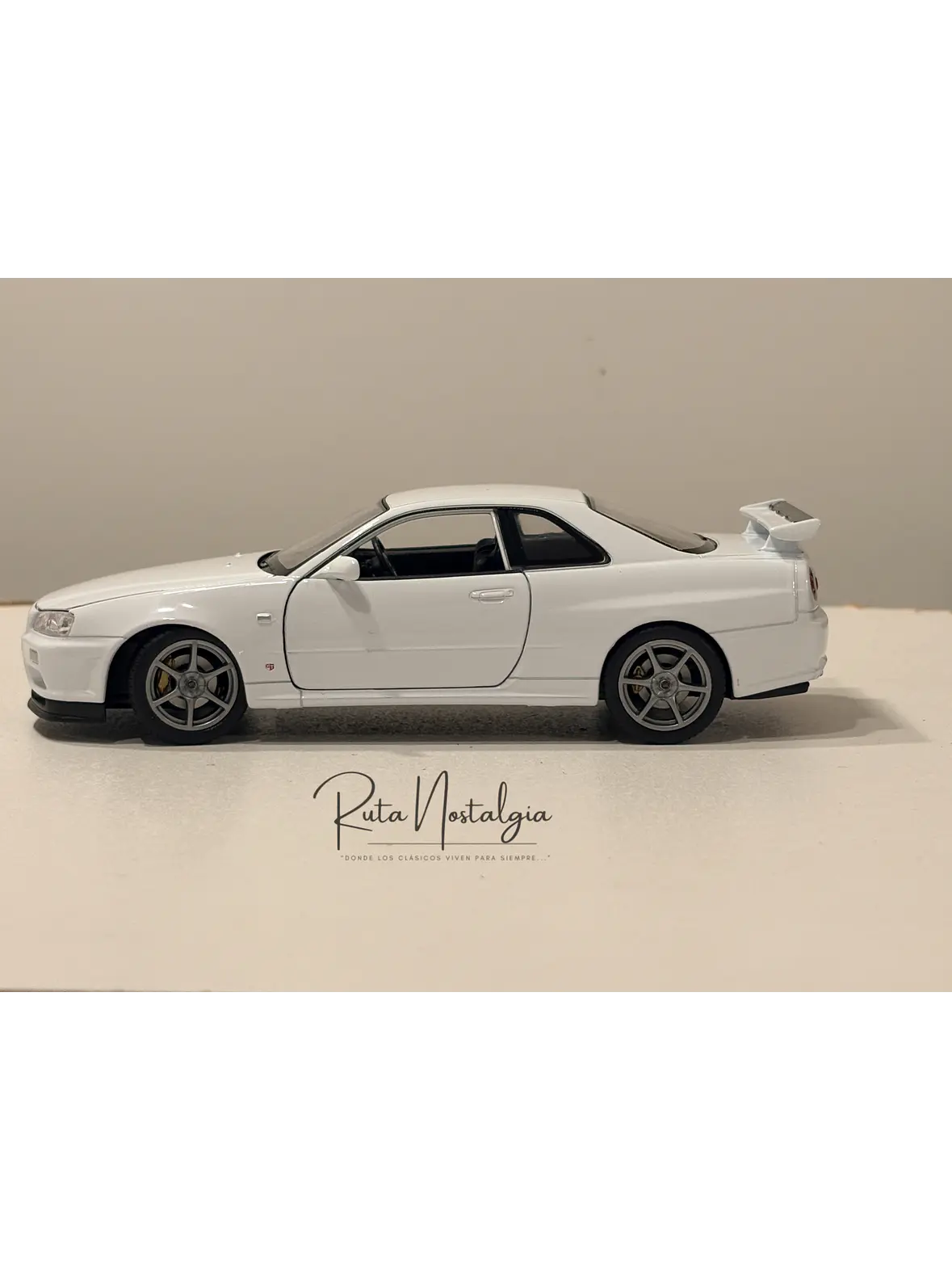 Nissan Skyline GT-R (R34) — Welly NEX Models 1:24 | JDM Legend de colección 6