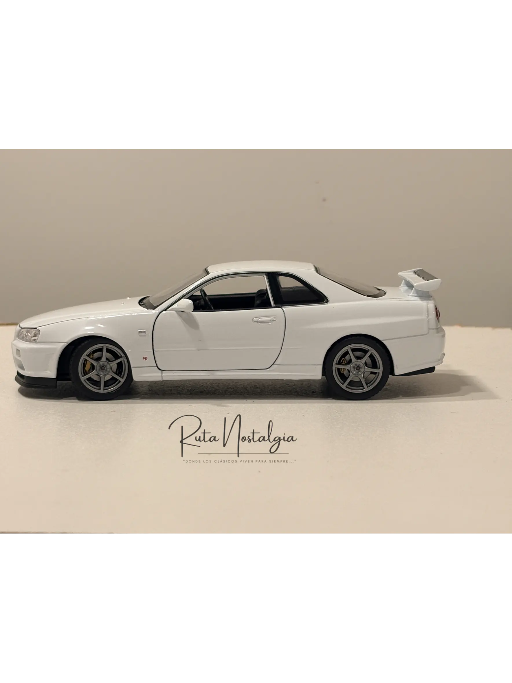 Nissan Skyline GT-R (R34) — Welly NEX Models 1:24 | JDM Legend de colección 6