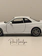 Nissan Skyline GT-R (R34) — Welly NEX Models 1:24 | JDM Legend de colección - Miniatura 6