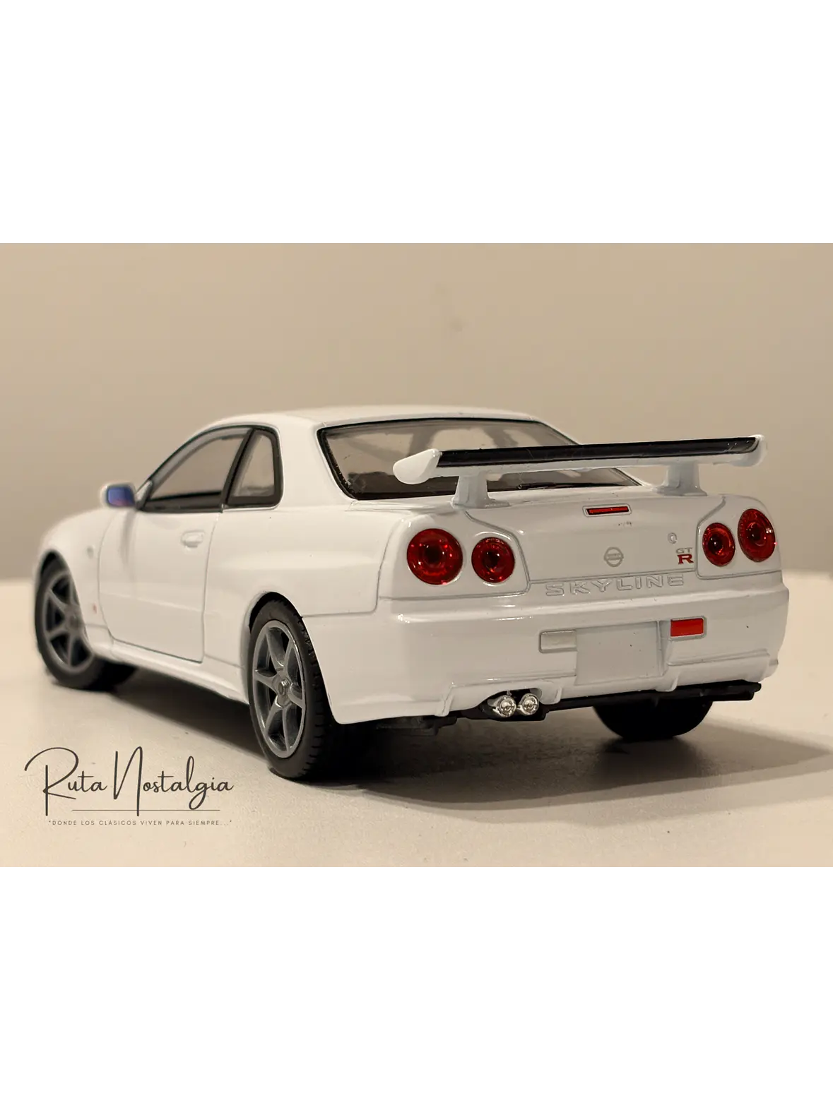 Nissan Skyline GT-R (R34) — Welly NEX Models 1:24 | JDM Legend de colección 7