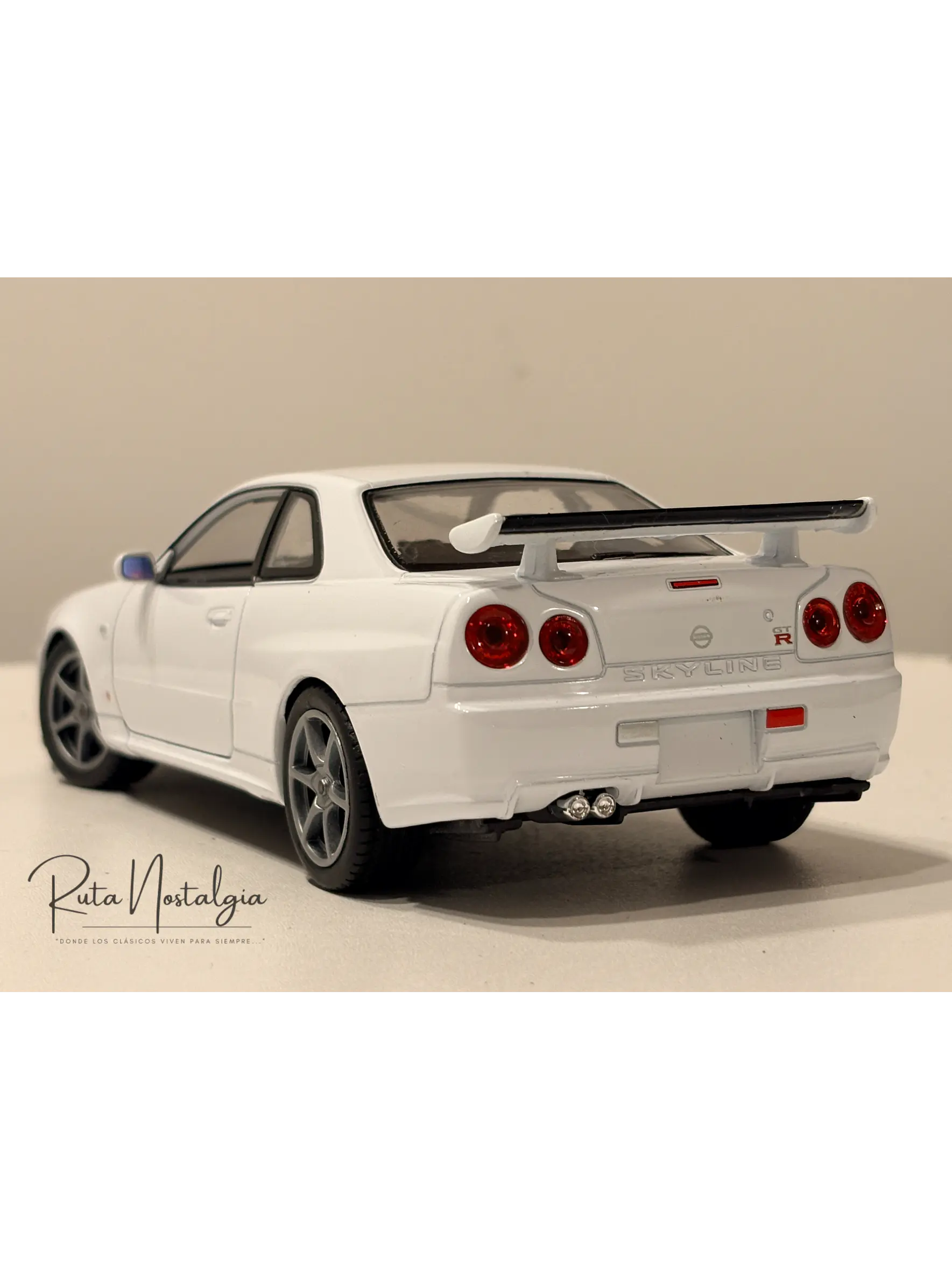 Nissan Skyline GT-R (R34) — Welly NEX Models 1:24 | JDM Legend de colección 7