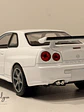 Nissan Skyline GT-R (R34) — Welly NEX Models 1:24 | JDM Legend de colección - Miniatura 7
