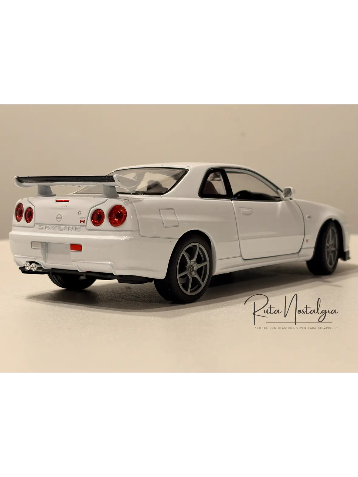 Nissan Skyline GT-R (R34) — Welly NEX Models 1:24 | JDM Legend de colección 8