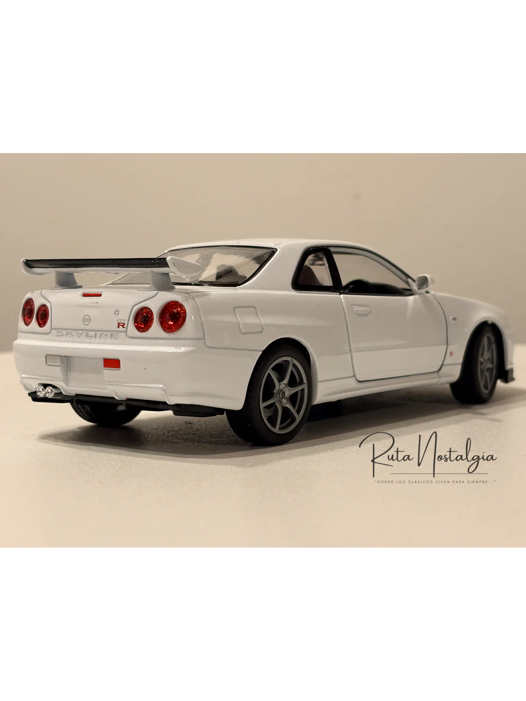 Nissan Skyline GT-R (R34) — Welly NEX Models 1:24 | JDM Legend de colección 8