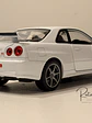 Nissan Skyline GT-R (R34) — Welly NEX Models 1:24 | JDM Legend de colección - Miniatura 8