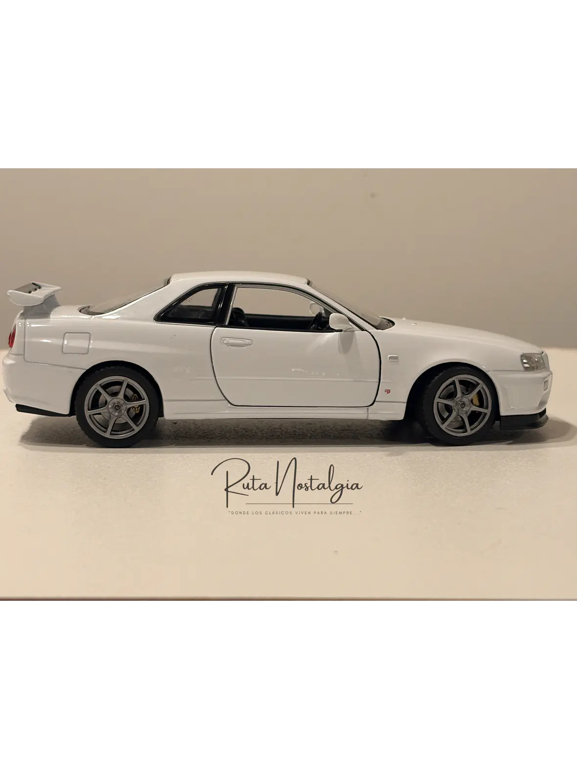 Nissan Skyline GT-R (R34) — Welly NEX Models 1:24 | JDM Legend de colección 9