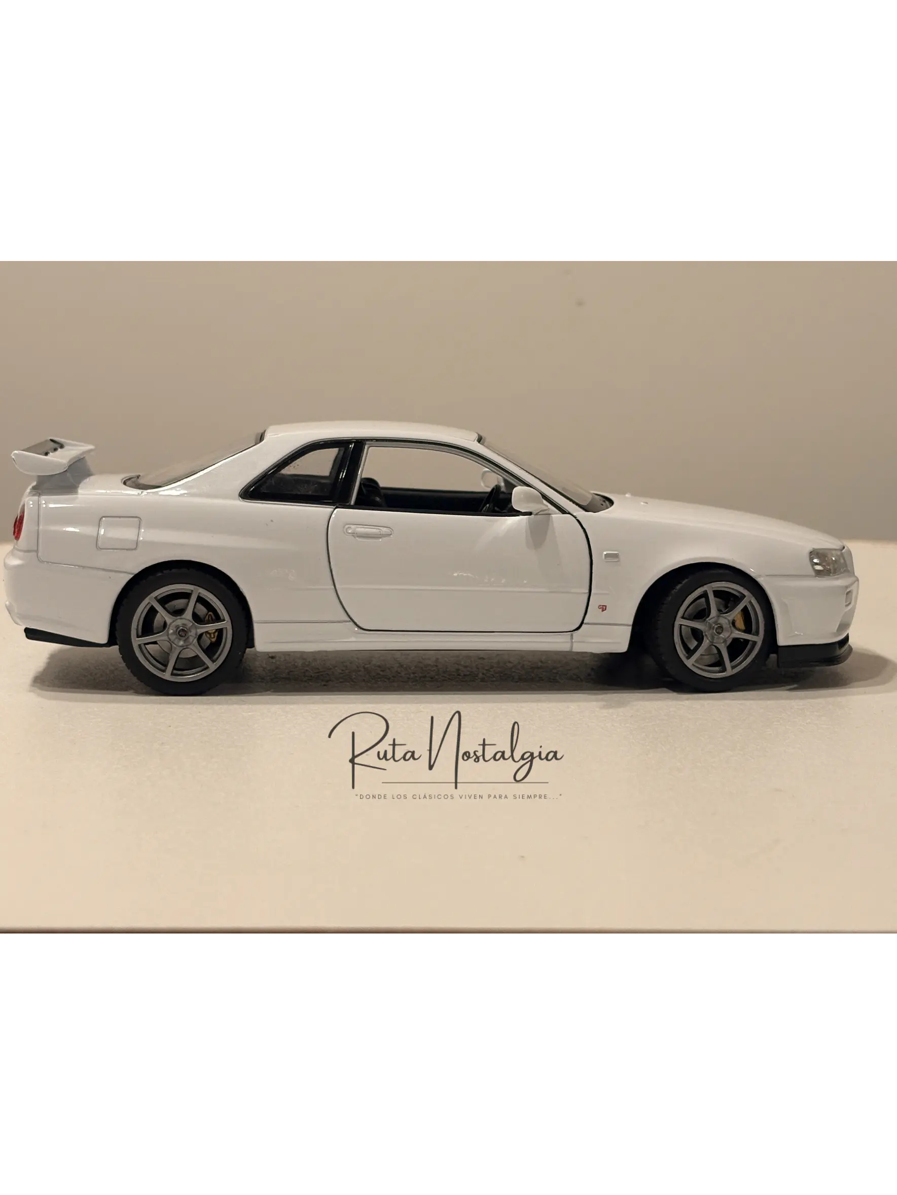 Nissan Skyline GT-R (R34) — Welly NEX Models 1:24 | JDM Legend de colección 9