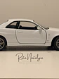 Nissan Skyline GT-R (R34) — Welly NEX Models 1:24 | JDM Legend de colección - Miniatura 9