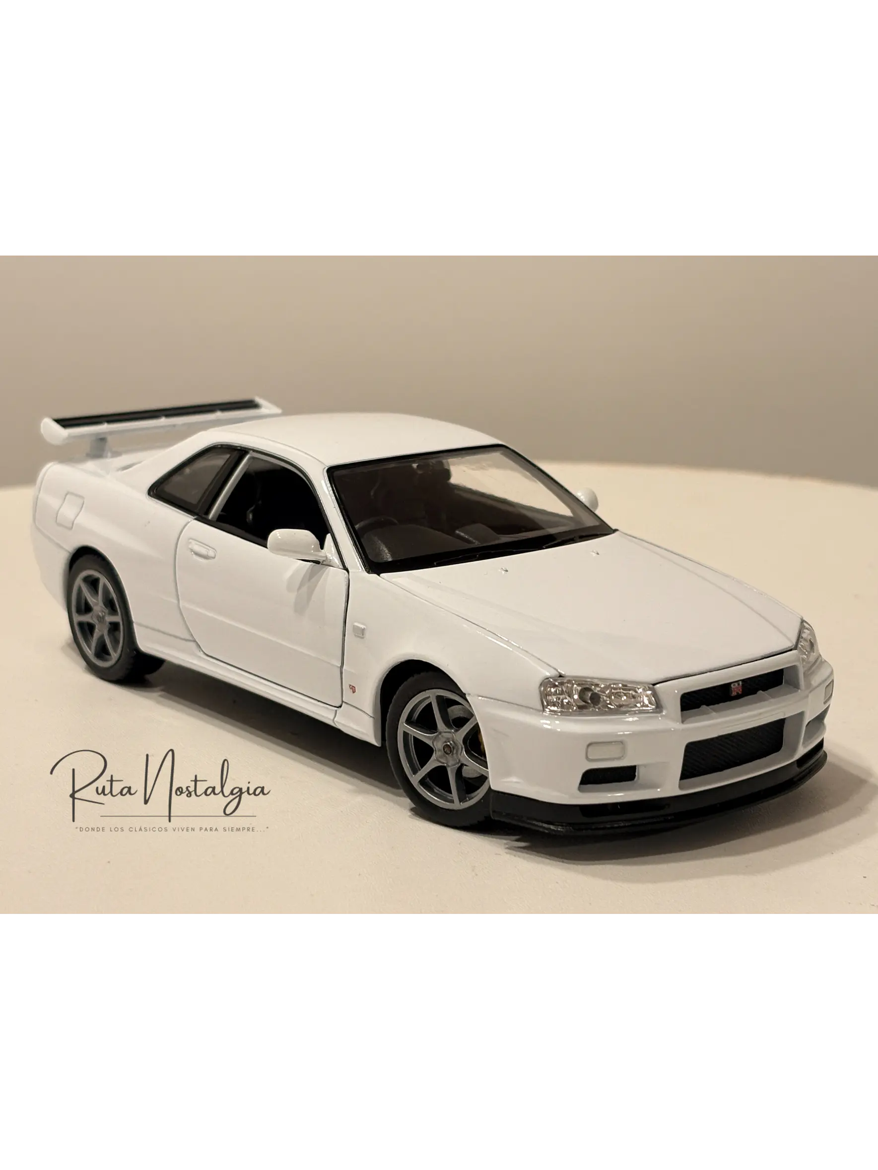 Nissan Skyline GT-R (R34) — Welly NEX Models 1:24 | JDM Legend de colección 10