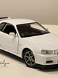 Nissan Skyline GT-R (R34) — Welly NEX Models 1:24 | JDM Legend de colección - Miniatura 10