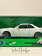 Nissan Skyline GT-R (R34) — Welly NEX Models 1:24 | JDM Legend de colección - Miniatura 11