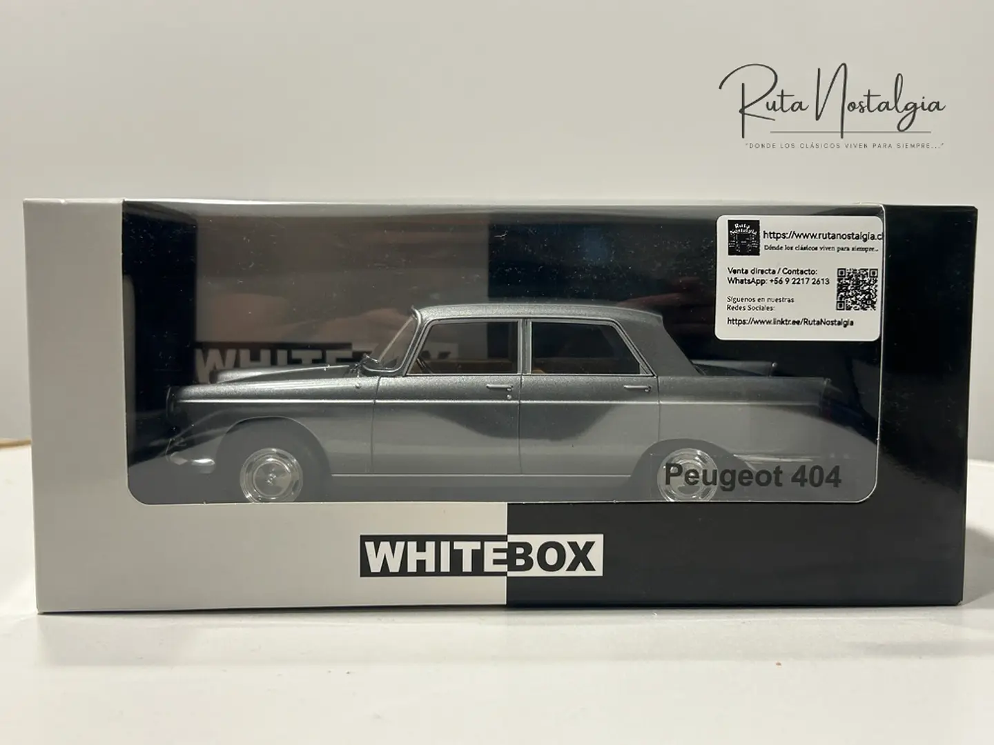 Peugeot 404 1960 — WhiteBox 1:24 | CAJA CON CARTÓN DAÑADO 10