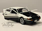 Auto Toyota Sprinter Trueno AE86 Blanco Negro Maisto 1:24 | CAJA DE CARTÓN CON DETALLES - Miniatura 1