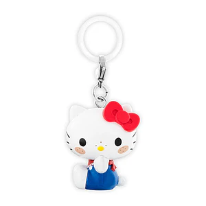 ハローキティ – Gachapon Monchhichi × Hello Kitty Mejirushi (a elección)