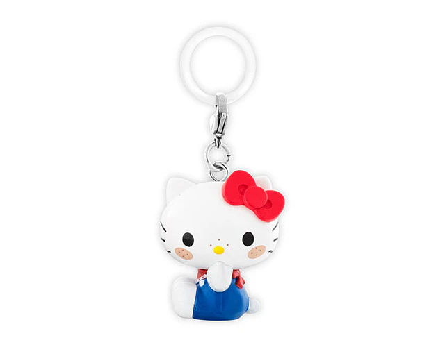 ハローキティ – Gachapon Monchhichi × Hello Kitty Mejirushi (a elección)