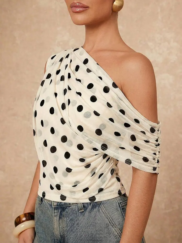 BLUSA ASIMETRICA DE LUNARES 1