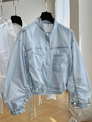 CHAQUETA CELESTE