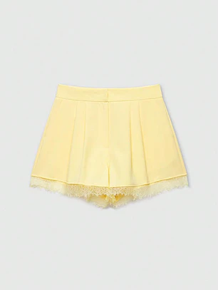 SHORT AMARILLO CON ENCAJE