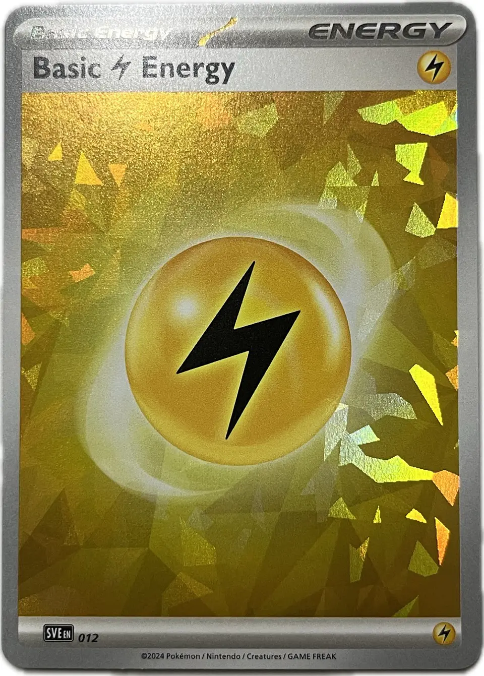 Basic Lightning Energy – SVE012 – Shattered Holo (Premium collection Terapagos) 1