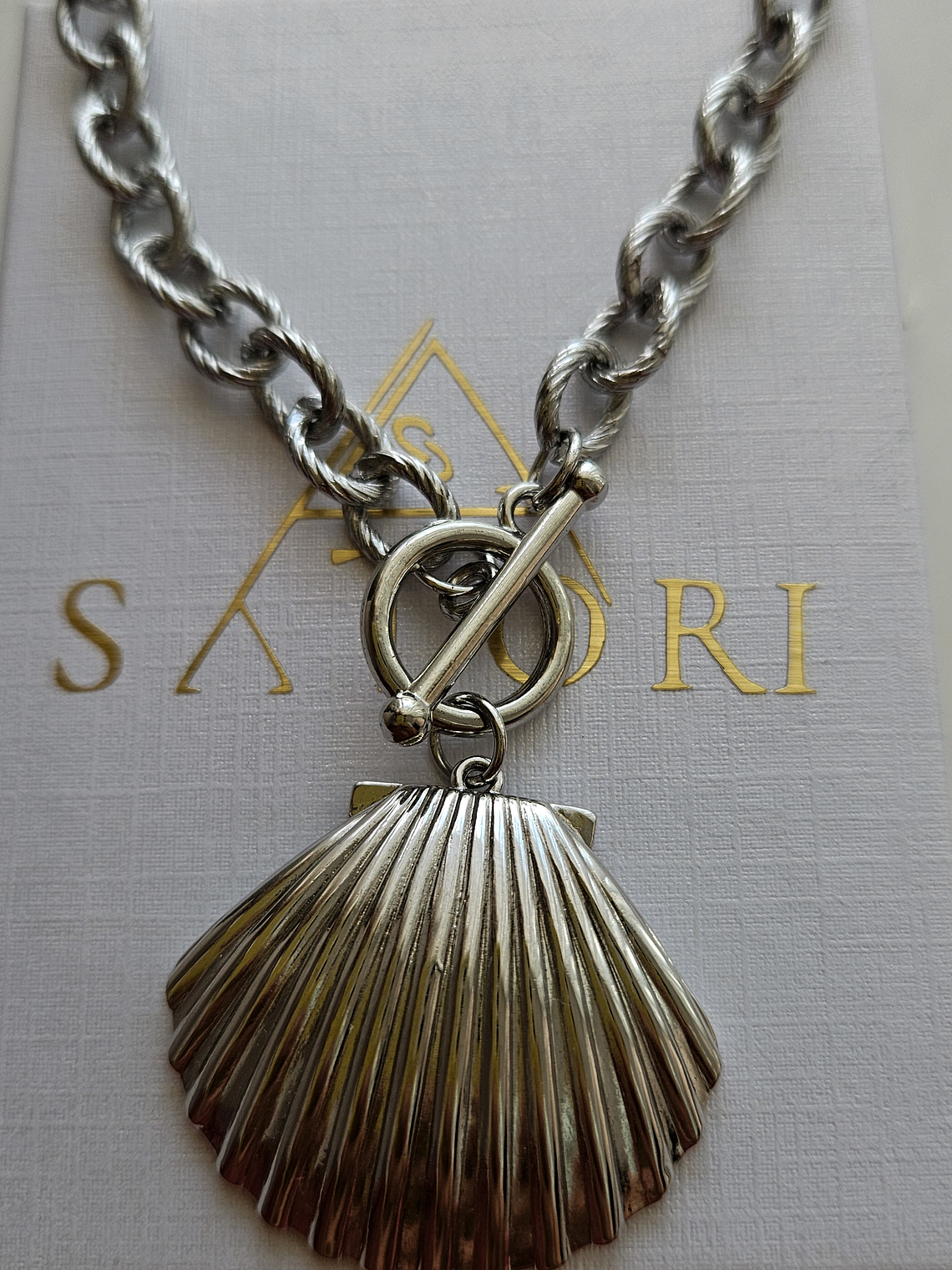 Collar con dije Maxi de conchita 1