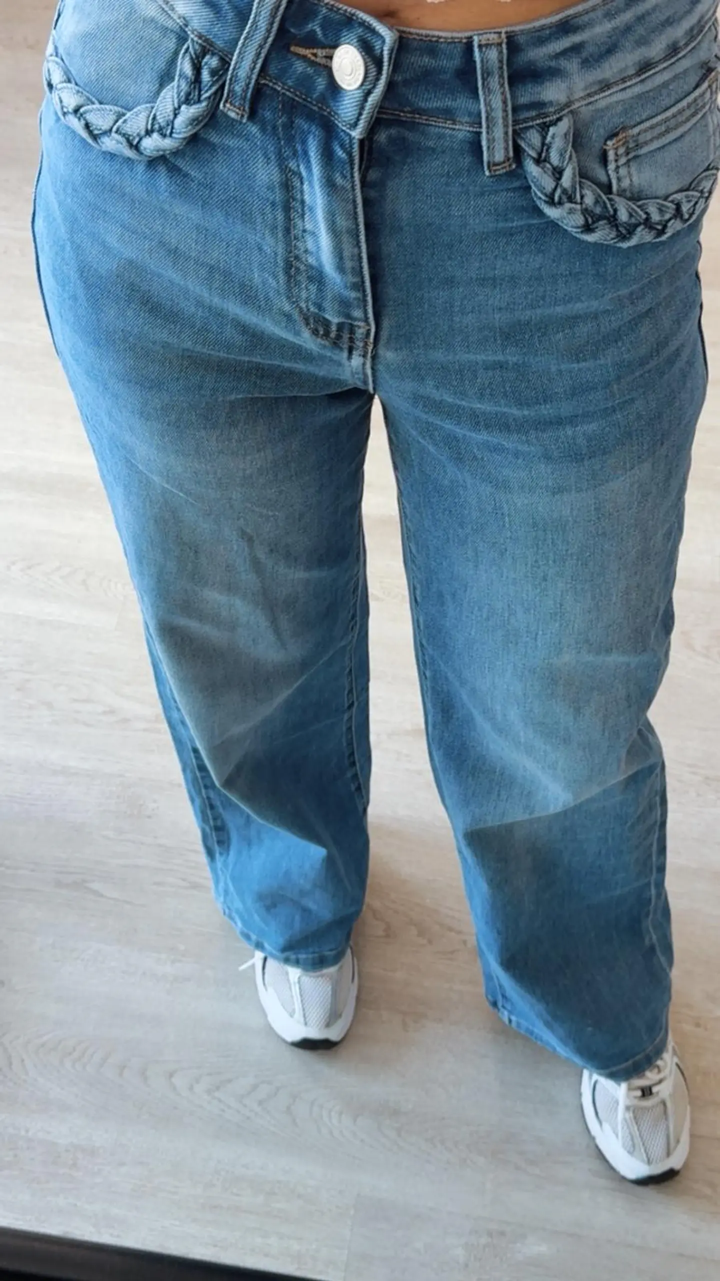 Calça de ganga com tranças nos bolsos 5