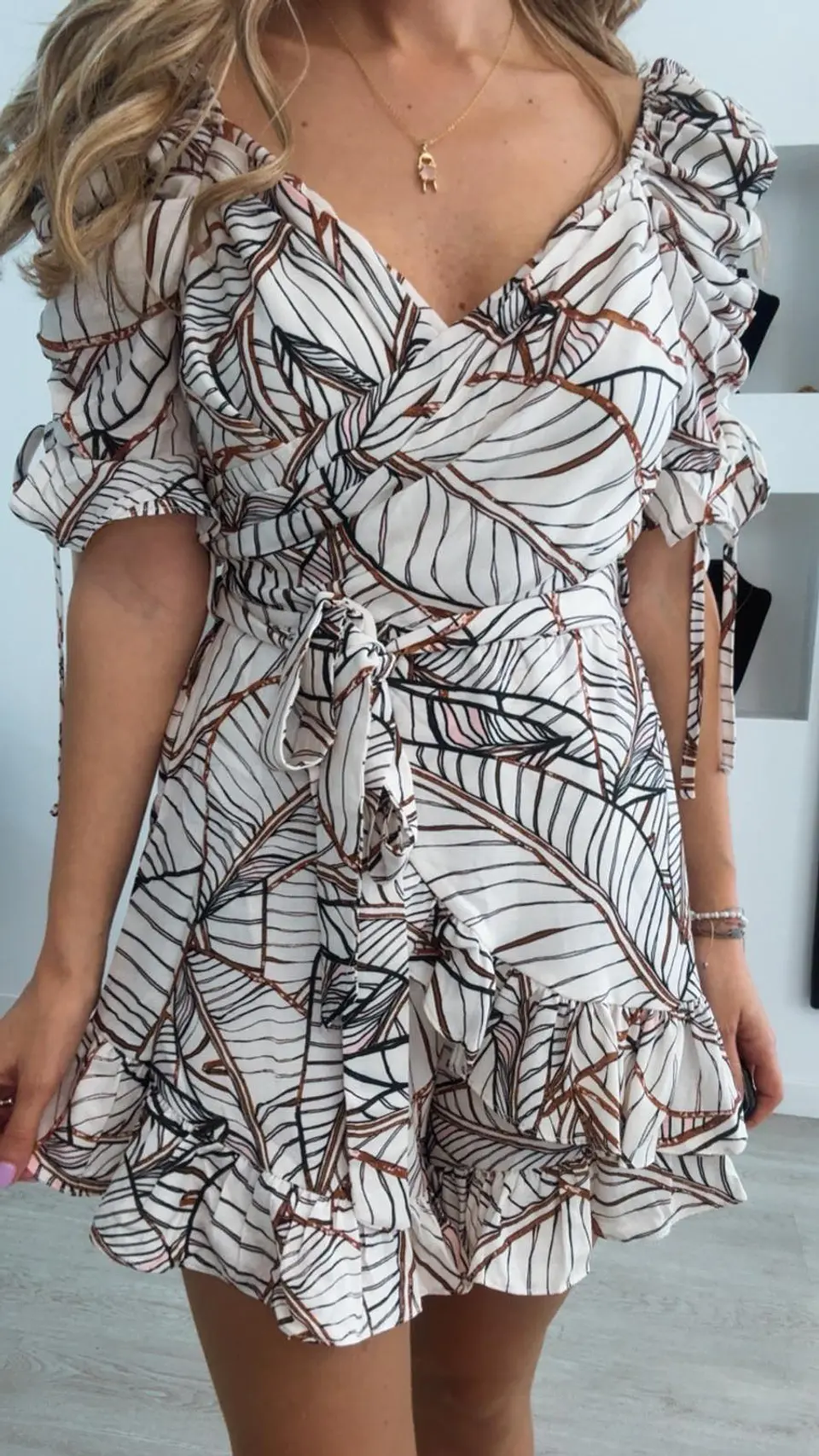 Macacão estampado com folhinhos 6