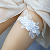Cinto de coxa de noiva com aplique de flores