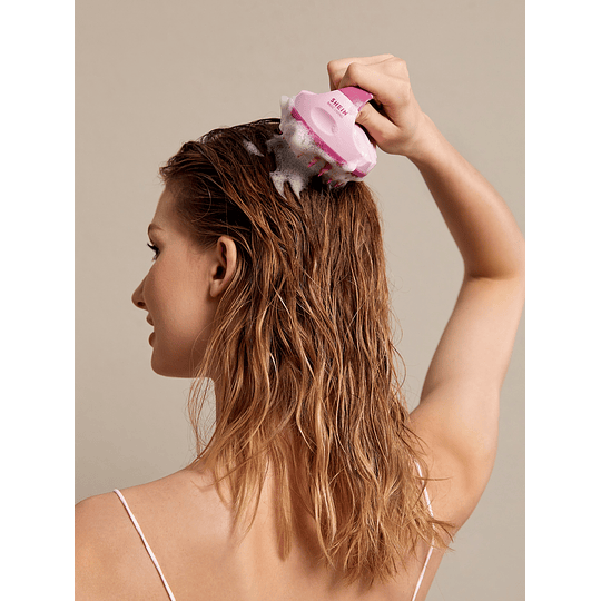 Escova de massagem com shampoo