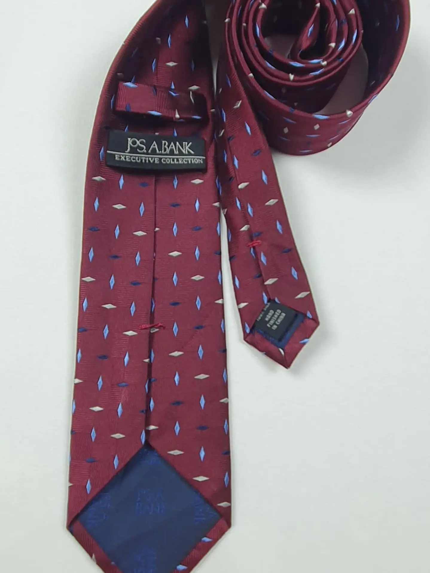 Corbata Jos. A. Bank Executive Collection – Burdeos con microdiseños 2