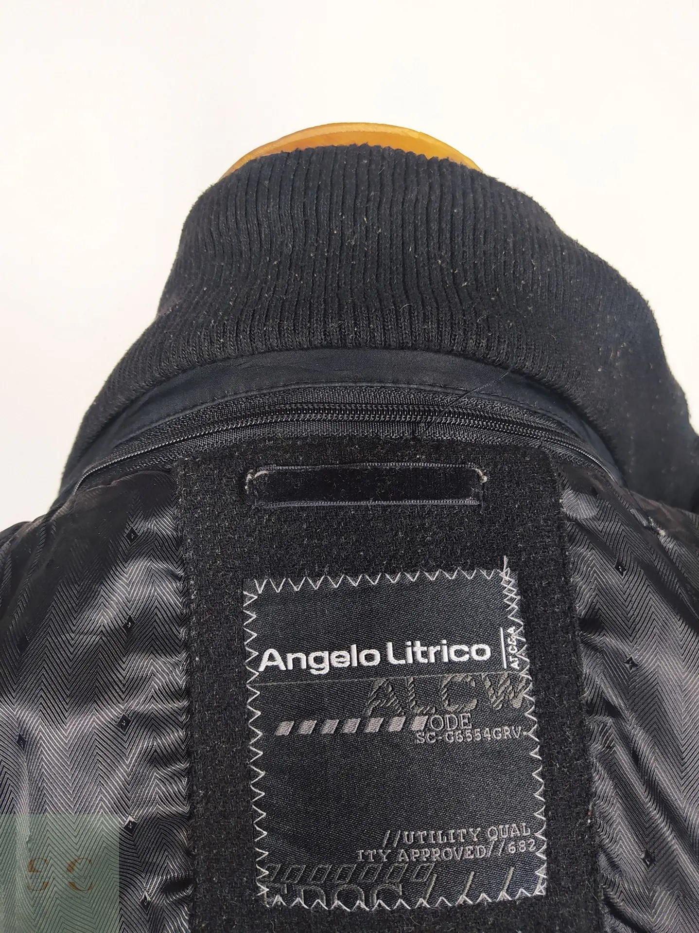 Abrigo de Mezcla de Lana Negro con Pechera Interna Angelo Litrico Talla L 16