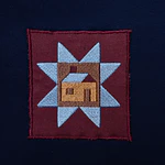 Polerón casa bordada