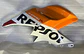 CARENADO SUPERIOR IZQUIERDO HONDA CB 190 REPSOL AÑO 2019-2024 - Miniatura 1