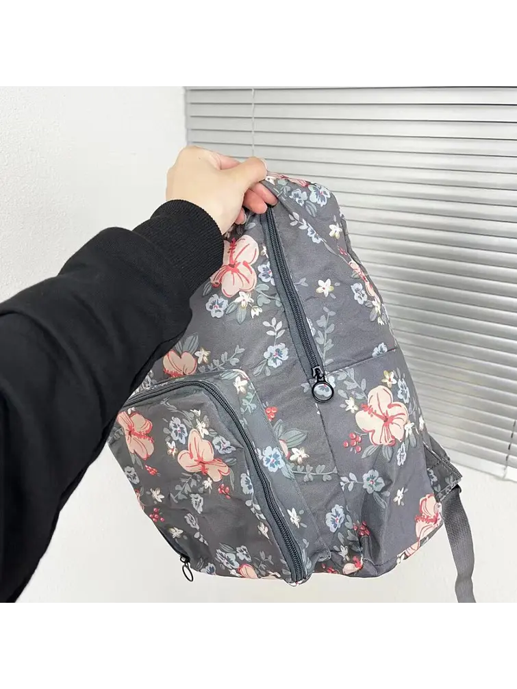 MOCHILA PLEGABLE ESTAMPADA 25*12*40 C/U            4