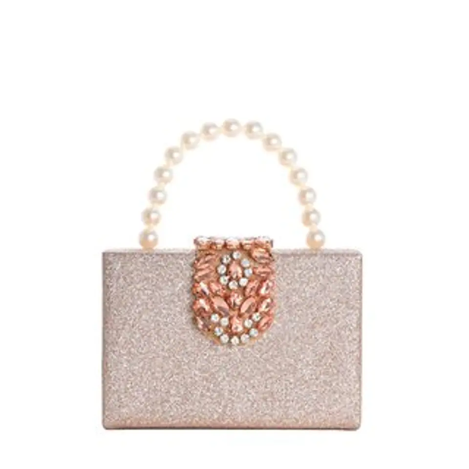 Pochette pour femme avec poignée textile souple confort porté main 1
