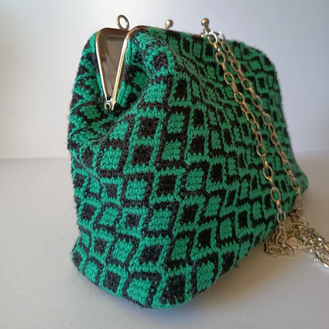 Cartera crochet Tapestry verde turquesa y negro
