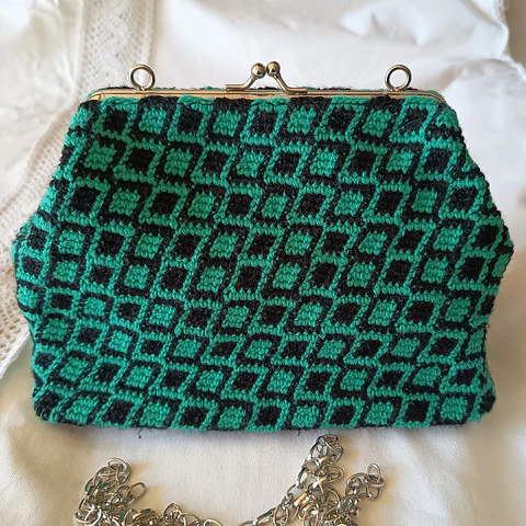 Cartera crochet Tapestry verde turquesa y negro