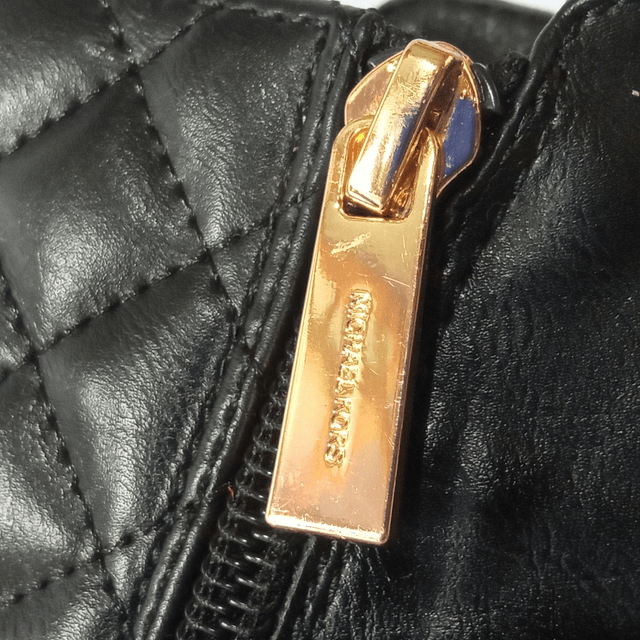 Michael Kors , 35 10